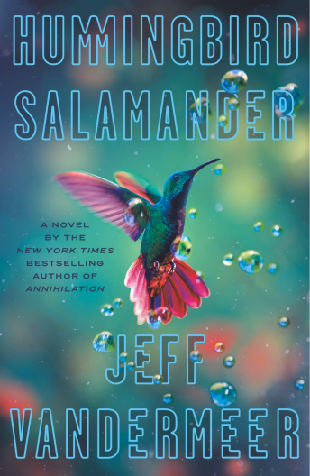 The book cover for "Hummingbird Salamander". A hummingbird in flight surrounded by water droplets against a blurred multicolored background.