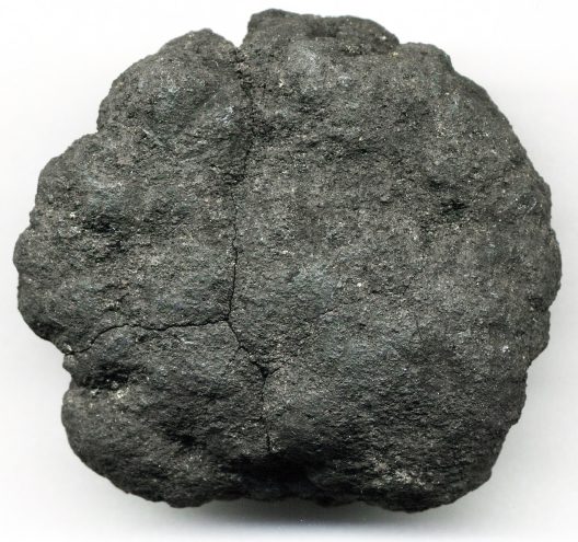 A course, bumpy, and slightly fissured grayish-black rock known as a polymetallic nodule