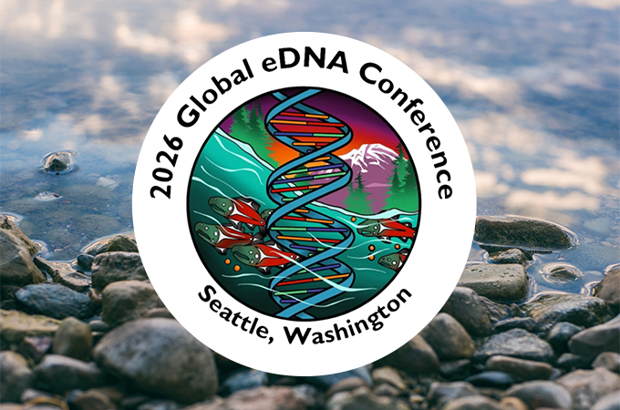 A circular “2026 Global eDNA Conference” logo overlays a rocky shoreline, showing a colorful DNA helix, fish, and mountain; calm, nature-focused tone.